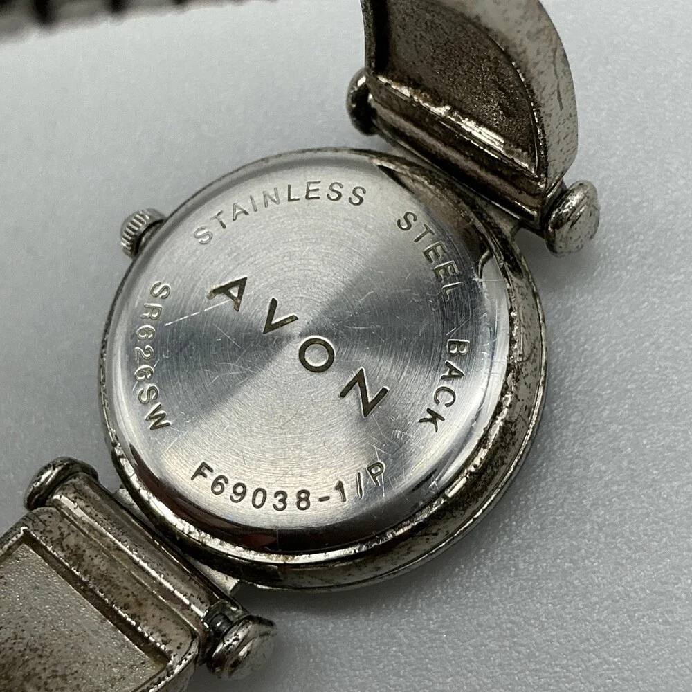 Avon F69038-1/P Women Watch 27mm Silver Tone Blue Bezel Stretch Band New Battery